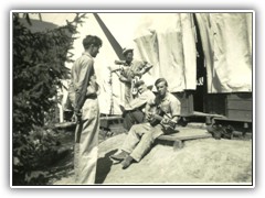 Elza Burge playing guitar in Spike Camp